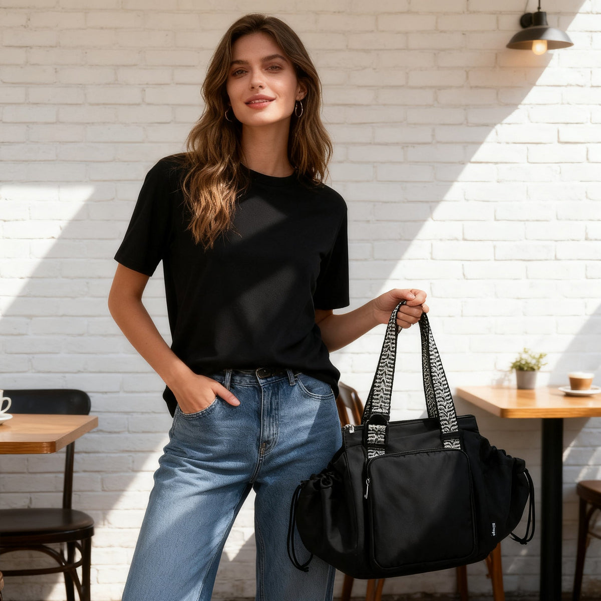 Woman carrying the Versatile Tote in an outdoor setting